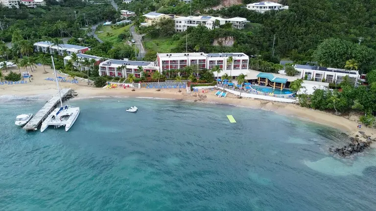 Aerial view of a beach resort and its pier